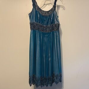 Ladies formal wear, dress with beaded straps, hem, neckline and high waist
